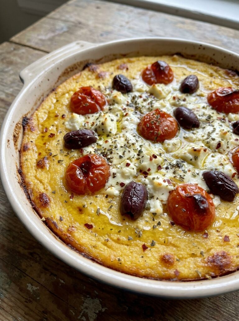 Mediterranean Baked Polenta with Tomatoes Feta and Olives Recipe 17 A realistic close up recipe photo 202605131738
